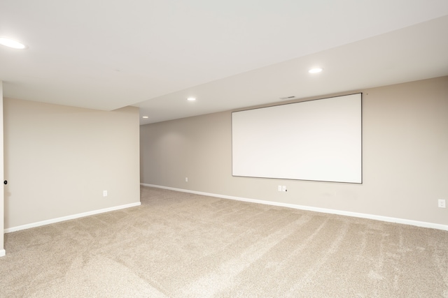 home theater with recessed lighting, baseboards, and light colored carpet