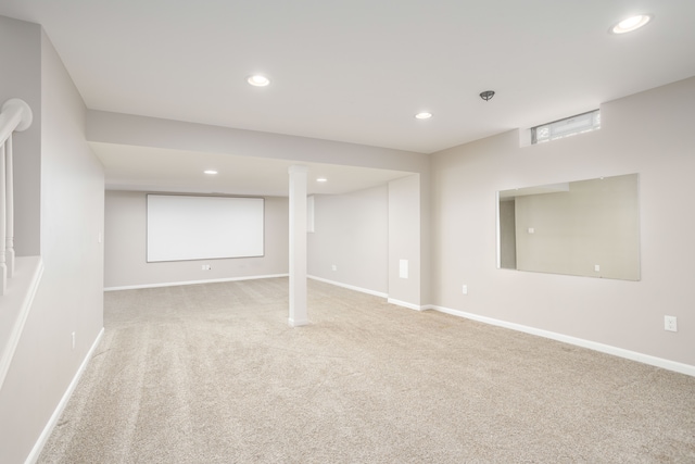 basement with carpet, recessed lighting, and baseboards