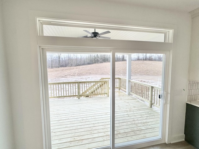 entryway with a ceiling fan