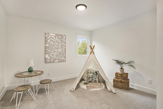 7711 96th St SE, Alto, MI 49302 - playroom featuring carpet flooring and baseboards