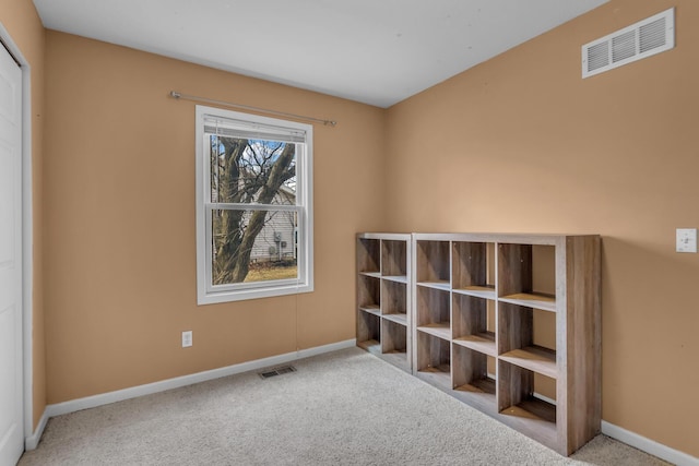 interior space with visible vents and baseboards