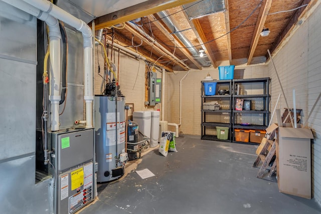 unfinished below grade area with brick wall, electric panel, and gas water heater