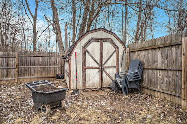 view of shed featuring a fenced backyard