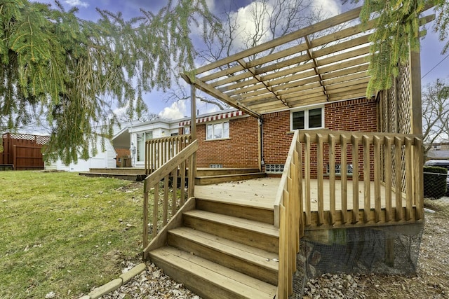 deck with fence and a yard