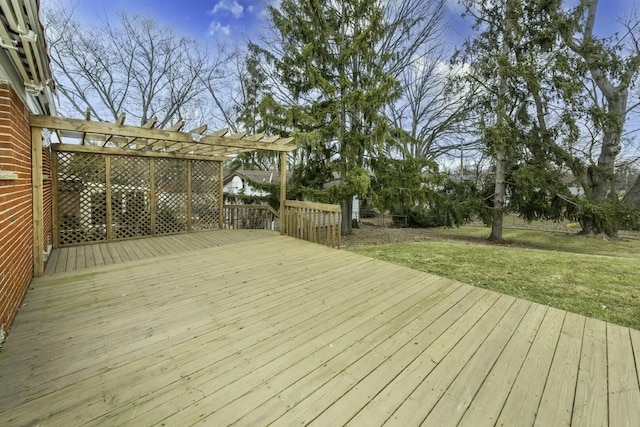 deck with a yard and a pergola