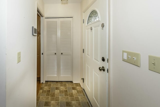 entryway with stone finish flooring