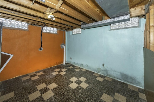 below grade area with tile patterned floors