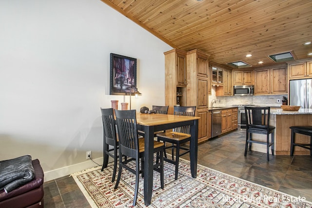 dining space featuring wooden ceiling, baseboards, vaulted ceiling, and recessed lighting