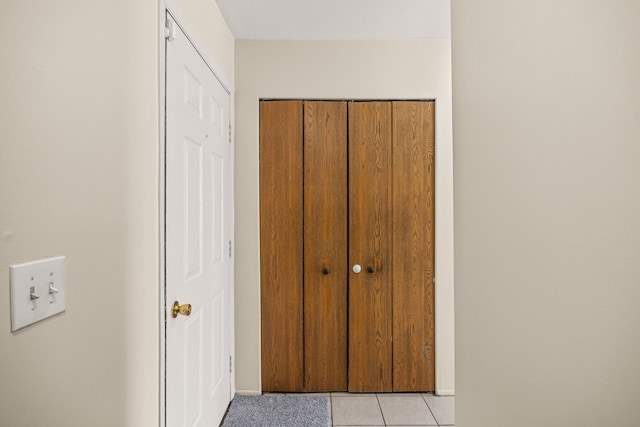 interior space featuring light tile patterned floors