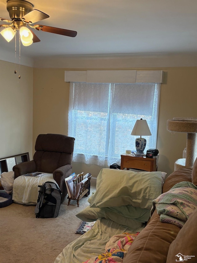 interior space featuring carpet flooring and a ceiling fan