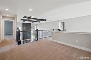 spare room with baseboards, carpet flooring, and recessed lighting