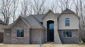 view of front of house featuring stone siding