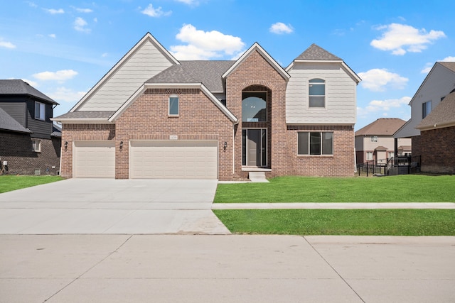 35689 Windridge Dr, New Baltimore, MI 48047 - traditional-style house featuring fence, brick siding, a garage, a front yard, and driveway