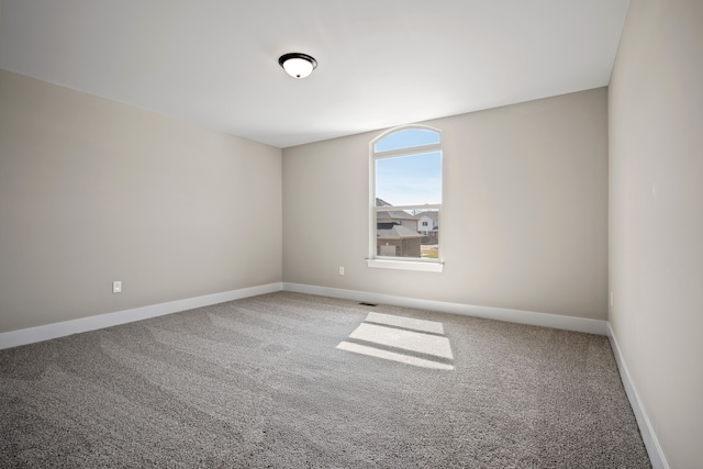 35689 Windridge Dr, New Baltimore, MI 48047 - carpeted empty room with baseboards and visible vents
