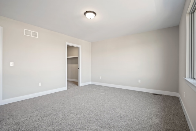 35689 Windridge Dr, New Baltimore, MI 48047 - carpeted empty room with baseboards and visible vents