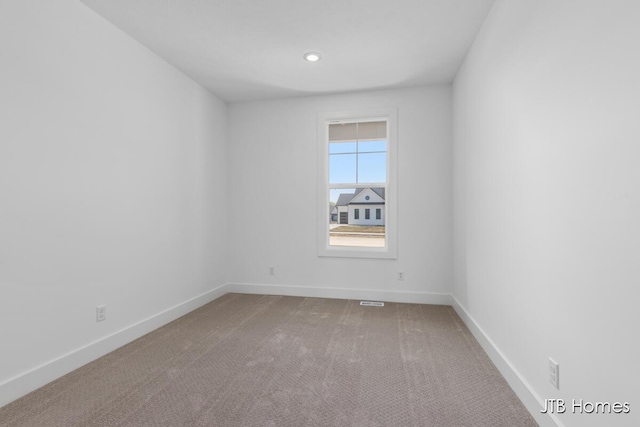 8123 Byron Depot Dr SW, Byron Center, MI 49315 - carpeted empty room featuring baseboards and recessed lighting