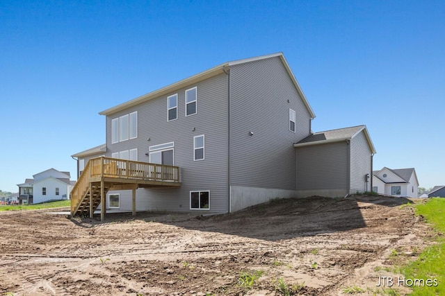 8123 Byron Depot Dr SW, Byron Center, MI 49315 - back of house with stairs and a wooden deck