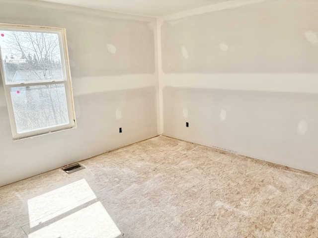 empty room with visible vents