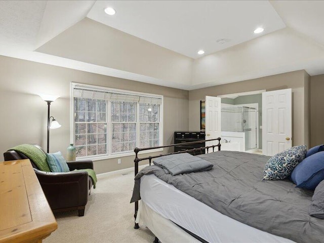 carpeted bedroom with baseboards, a raised ceiling, and recessed lighting