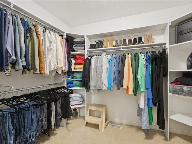 walk in closet with visible vents