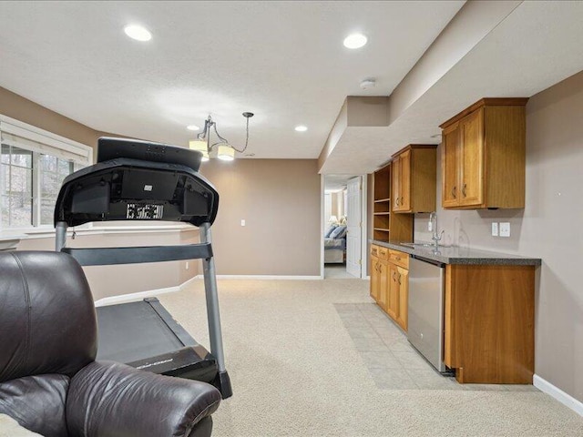 exercise area with recessed lighting, light carpet, and baseboards