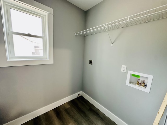 2653 Mclaughlin Ave, Muskegon, MI 49442 - laundry room featuring laundry area, hookup for a washing machine, baseboards, hookup for an electric dryer, and dark wood-style floors