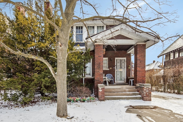 view of front of house with brick siding