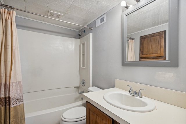 bathroom with toilet, shower / bath combo, visible vents, and vanity