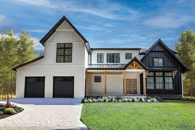 modern farmhouse with decorative driveway, board and batten siding, a standing seam roof, a garage, and a front lawn