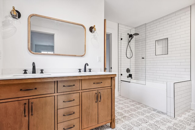 bathroom featuring double vanity, a sink, and shower / tub combination