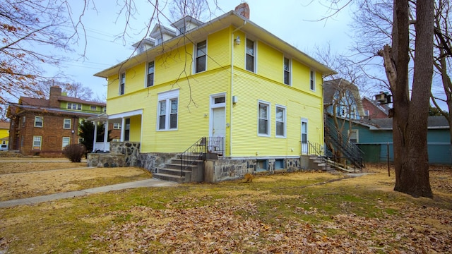 exterior space featuring a chimney