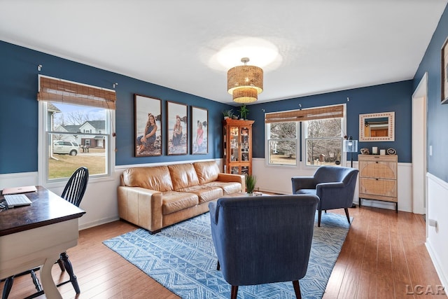 living area with hardwood / wood-style flooring