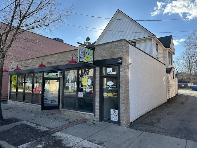 exterior space featuring concrete block siding