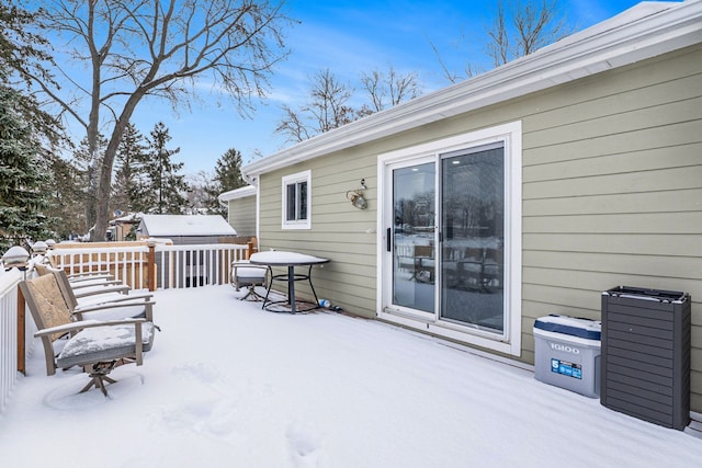 view of snow covered deck