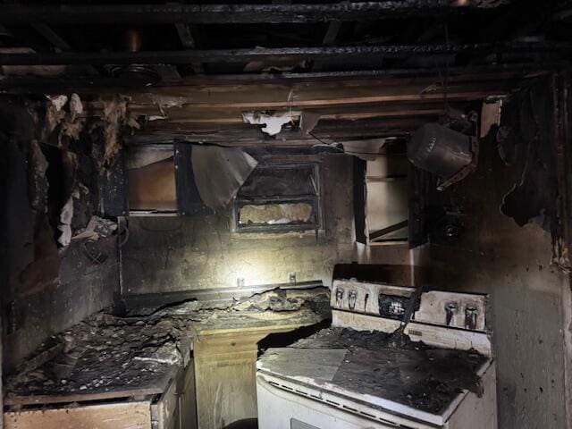 kitchen featuring white gas range