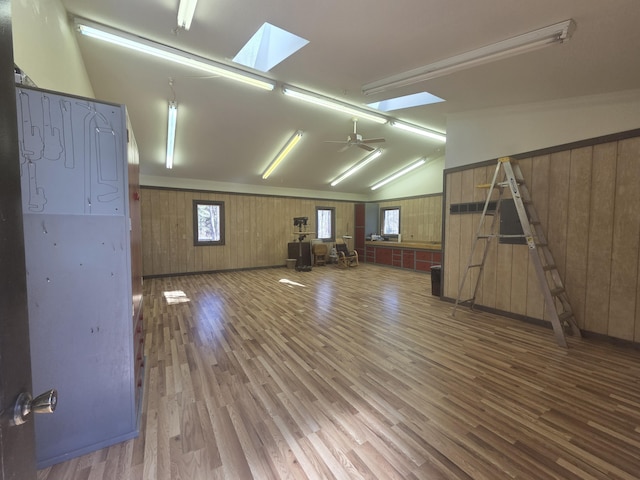 3075 Mineral Springs Trl, Mount Pleasant, MI 48858 - bonus room featuring a skylight, wood finished floors, wooden walls, and vaulted ceiling