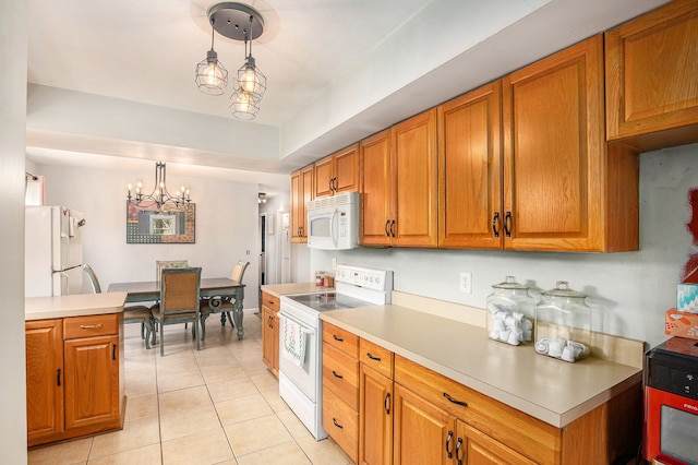 kitchen featuring white appliances, brown cabinets, light tile patterned flooring, and light countertops