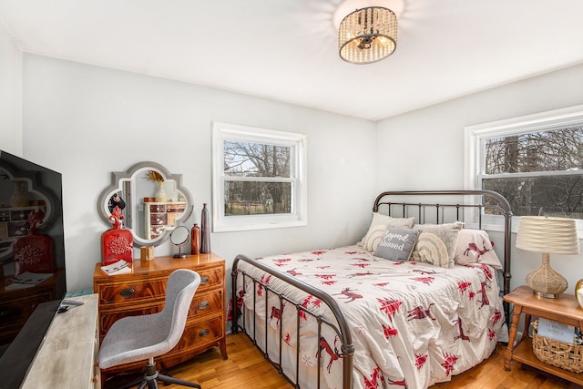 bedroom featuring light wood finished floors