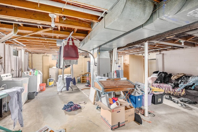 unfinished basement with independent washer and dryer