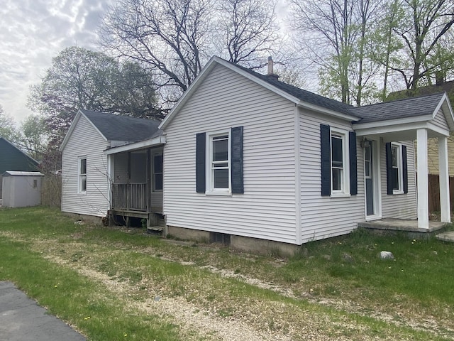 221 James St, Allegan, MI 49010 - view of home's exterior featuring a porch