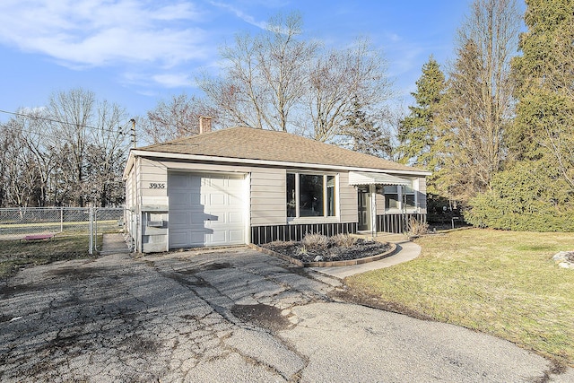 view of front of property with aphalt driveway, a shingled roof, fence, a chimney, and a front yard