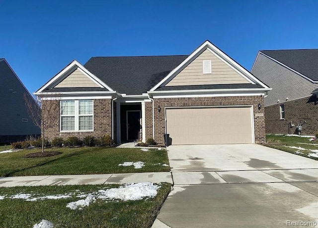 3011 Sheffield Cir, Clarkston, MI 48346 - view of front of home featuring brick siding, a garage, driveway, and a front lawn