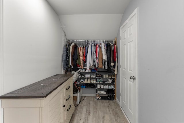 walk in closet featuring light wood-style flooring