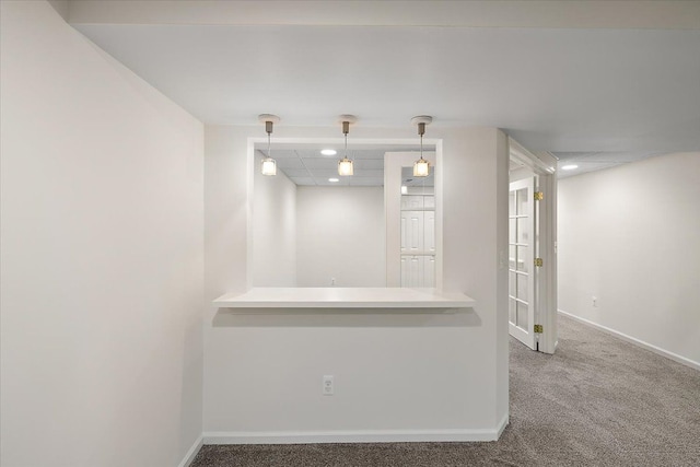 interior space featuring carpet floors, recessed lighting, a paneled ceiling, and baseboards