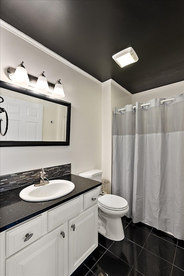 bathroom with toilet, tile patterned floors, a shower with curtain, and vanity