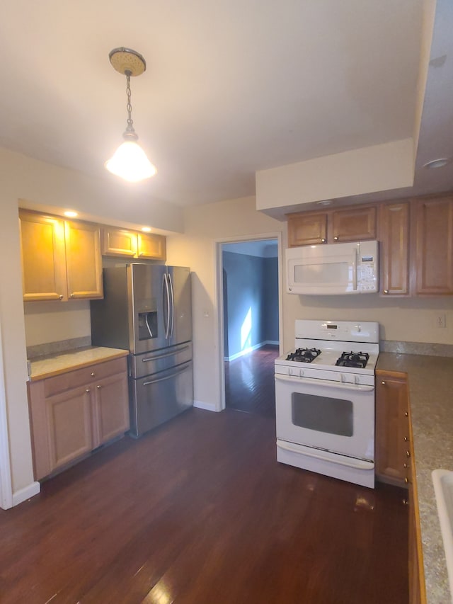 kitchen with white appliances, baseboards, dark wood-style flooring, light countertops, and pendant lighting