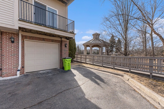 garage featuring driveway