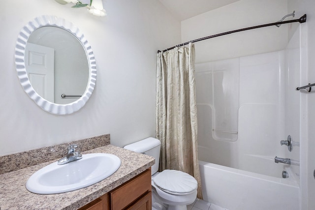 bathroom with toilet, vanity, and shower / tub combo