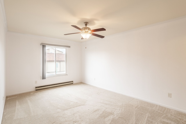 carpeted empty room with a ceiling fan, baseboards, crown molding, and baseboard heating