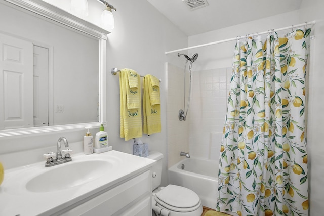 bathroom featuring visible vents, toilet, vanity, and shower / tub combo with curtain